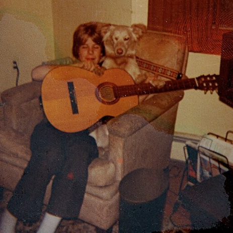 Teddy with guitar and dog 1975