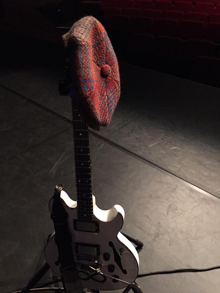 Teddy Kumpel's guitar and cap